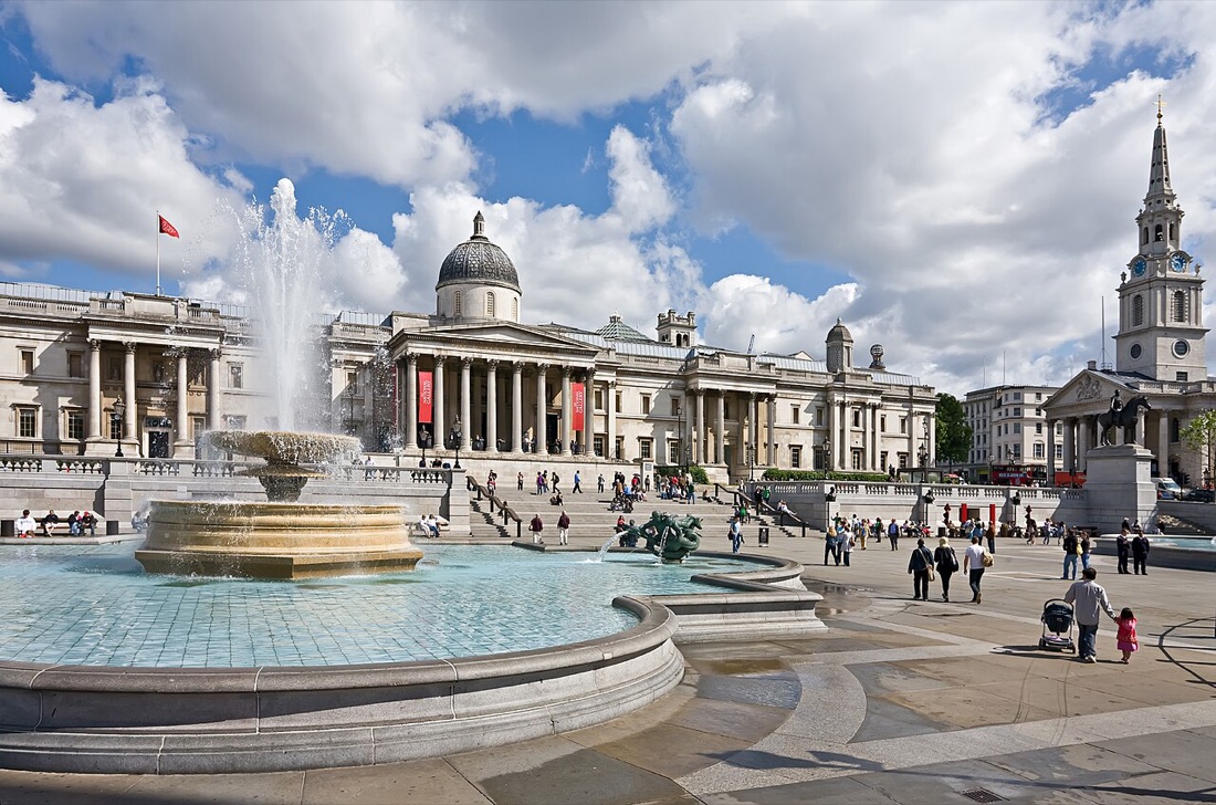 Trafalgar Square's fountain with the National Gallery behind